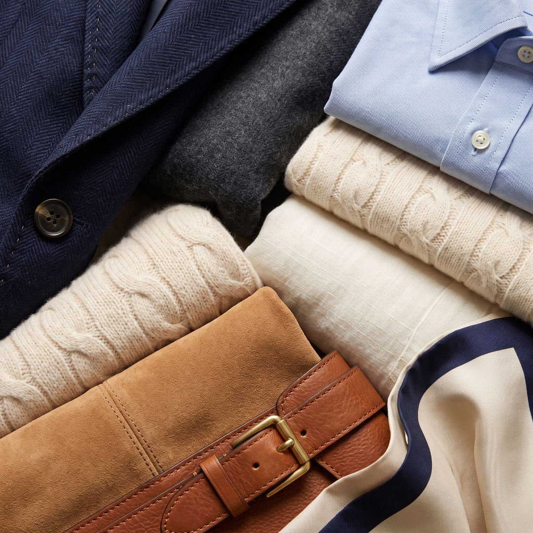 Close up of wool herringbone, flannel, oxford cotton, cable knit, linen, suede, leather and silk